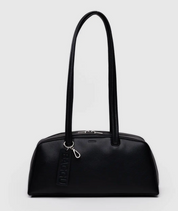 Black recycled leather handbag with a handle on a light gray background