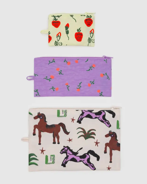 Three pouches with different patterns on a white background