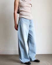 Light blue jeans Wide Barrel Denim - Light Wash wearing black ballet flats and cream ribbed top