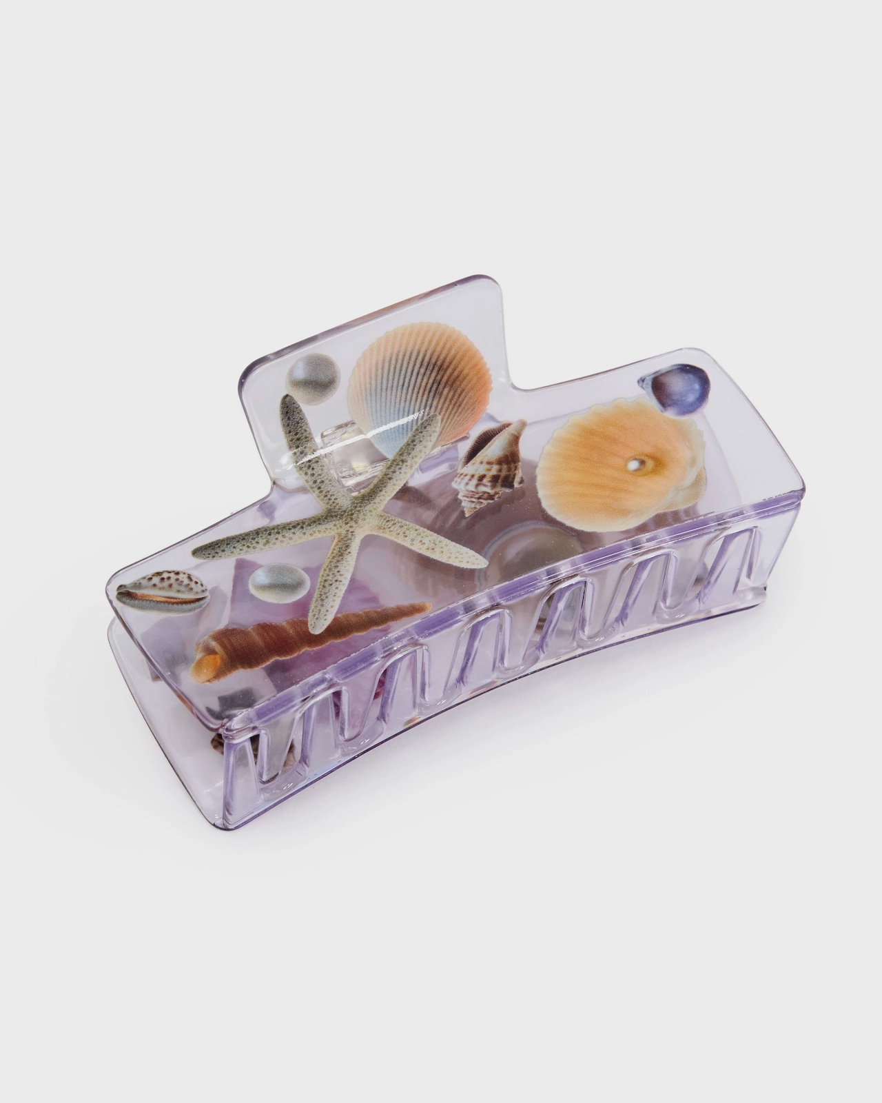 Clear rectangular container with sea-themed decorations on a white background