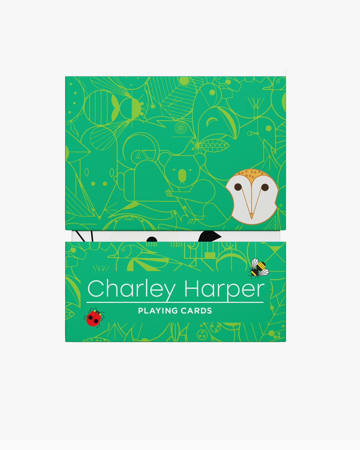Green playing card box with owl illustration and 'Charley Harper' branding on a white background