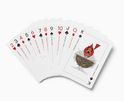 Set of playing cards with unique designs on a white background