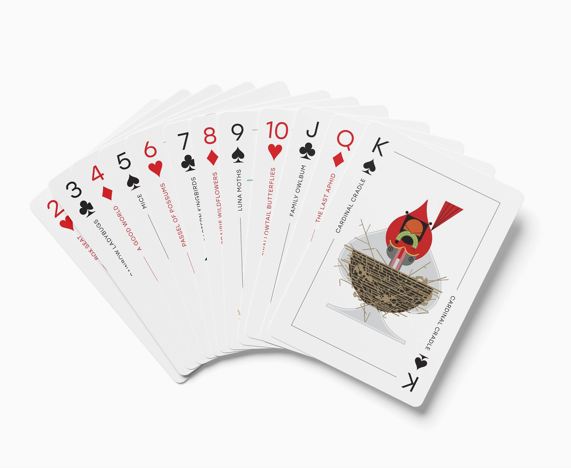 Set of playing cards with unique designs on a white background