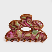 Marbled hair clip on a white background