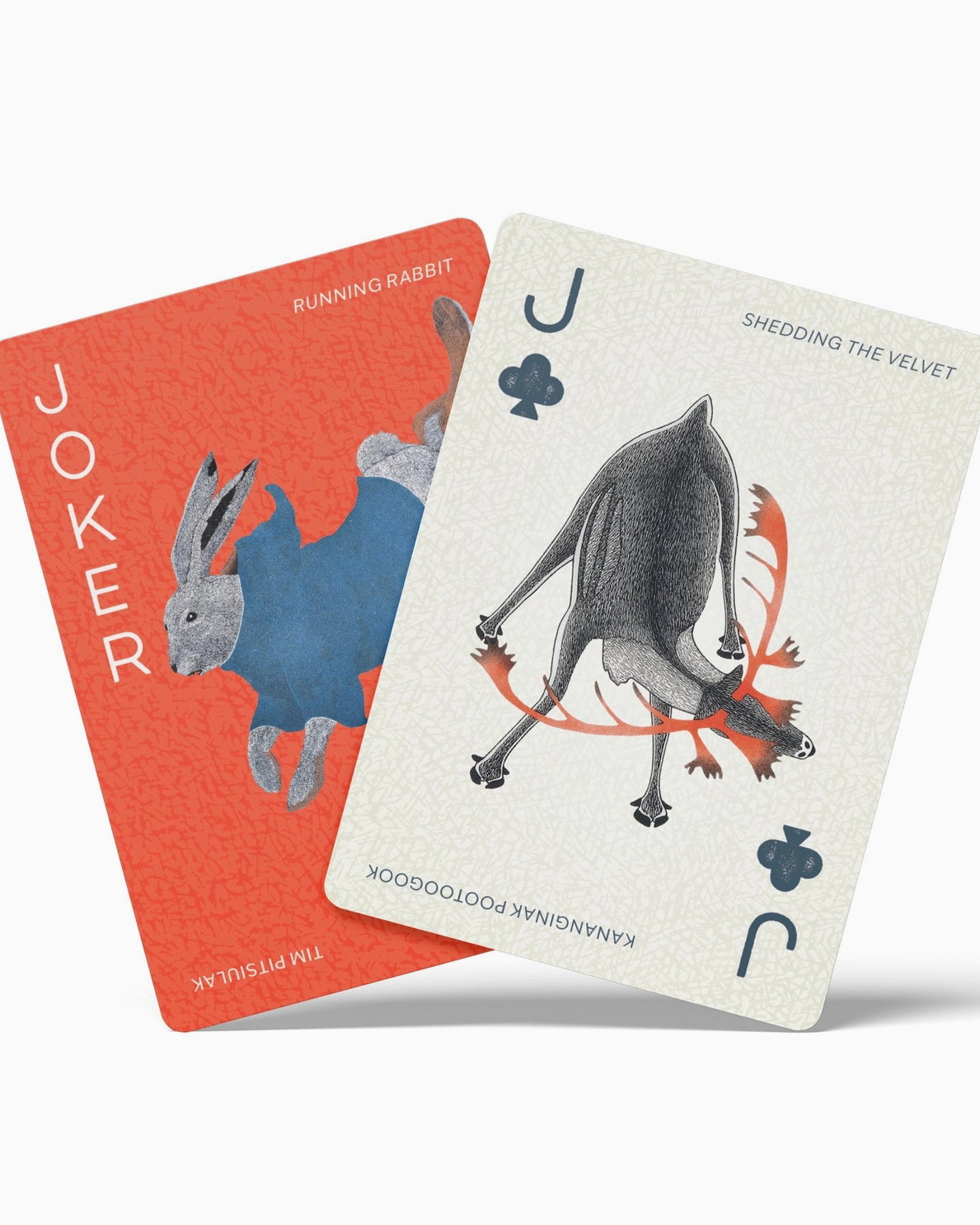Two playing cards with animal illustrations on a white background