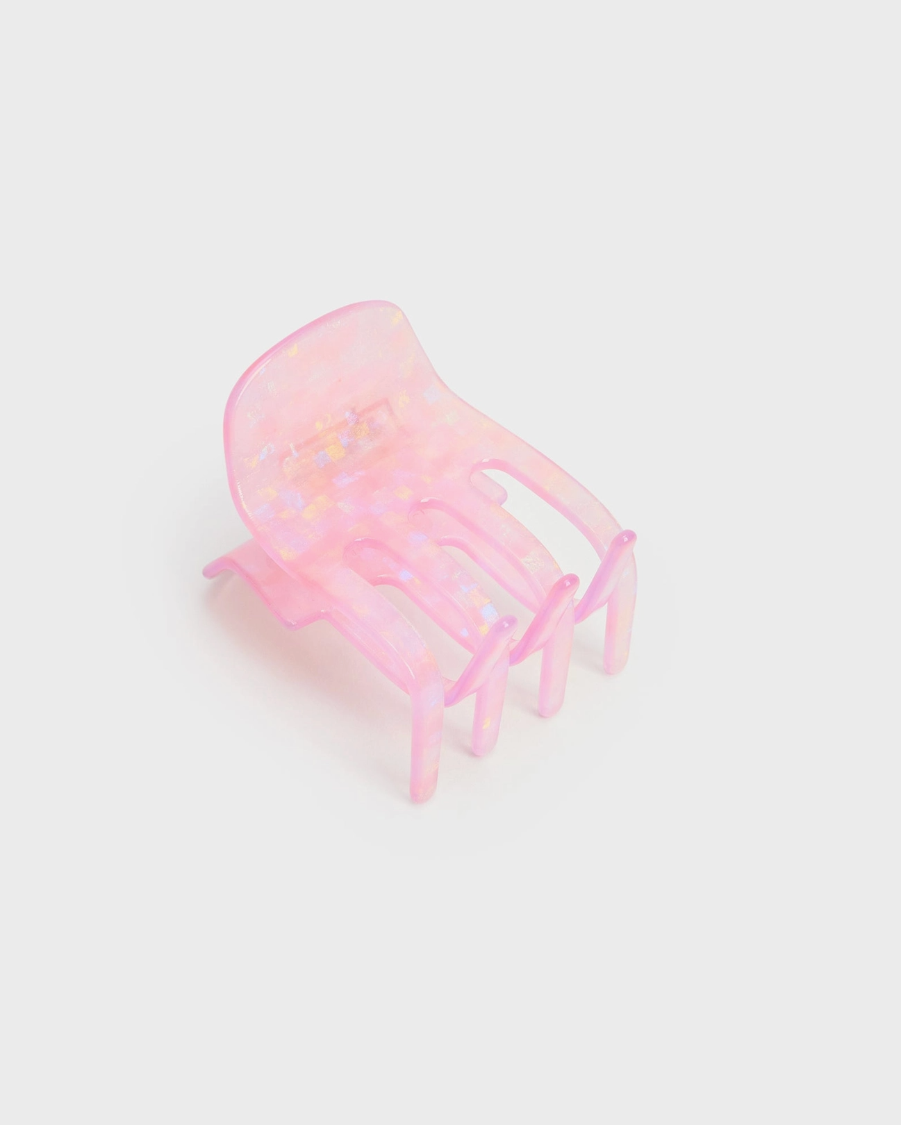 Pink jellyfish toy on a light gray background