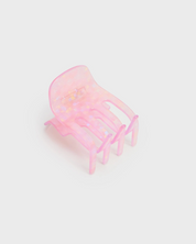 Pink jellyfish toy on a light gray background